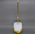 Brosse de toilette à main dorée