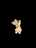 Orange tabby cat figurine