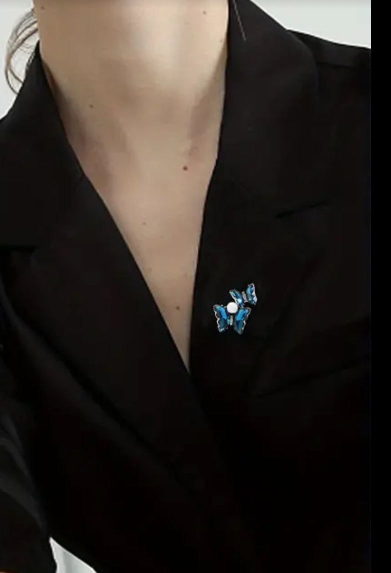 Broche papillons bleus