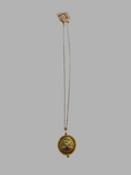 Necklace with magnifying glass