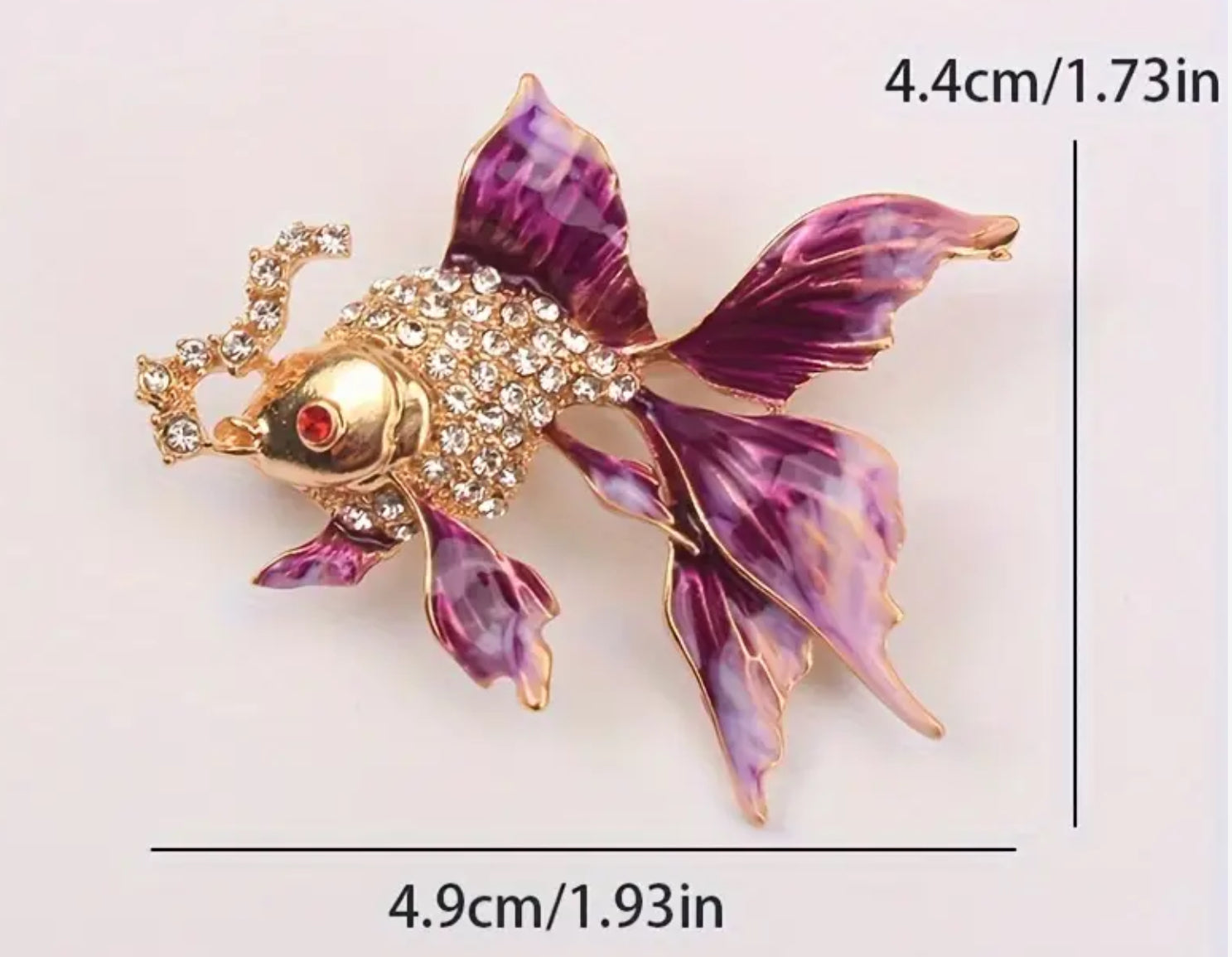 Broche poisson en or et diamant violet