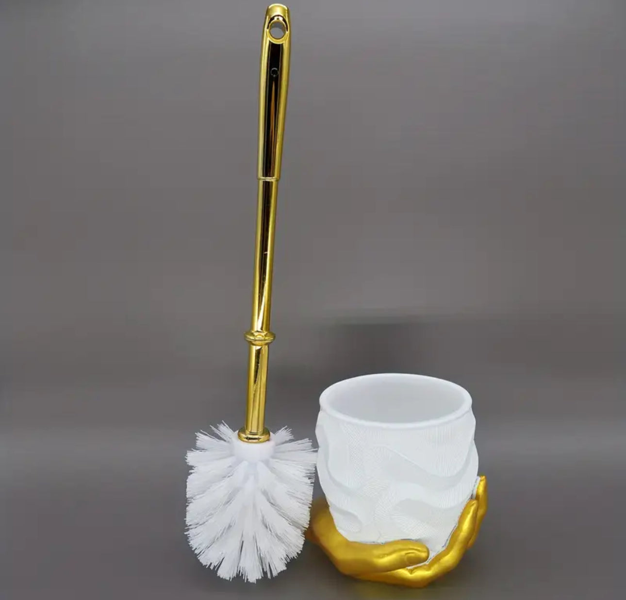 Brosse de toilette à main dorée