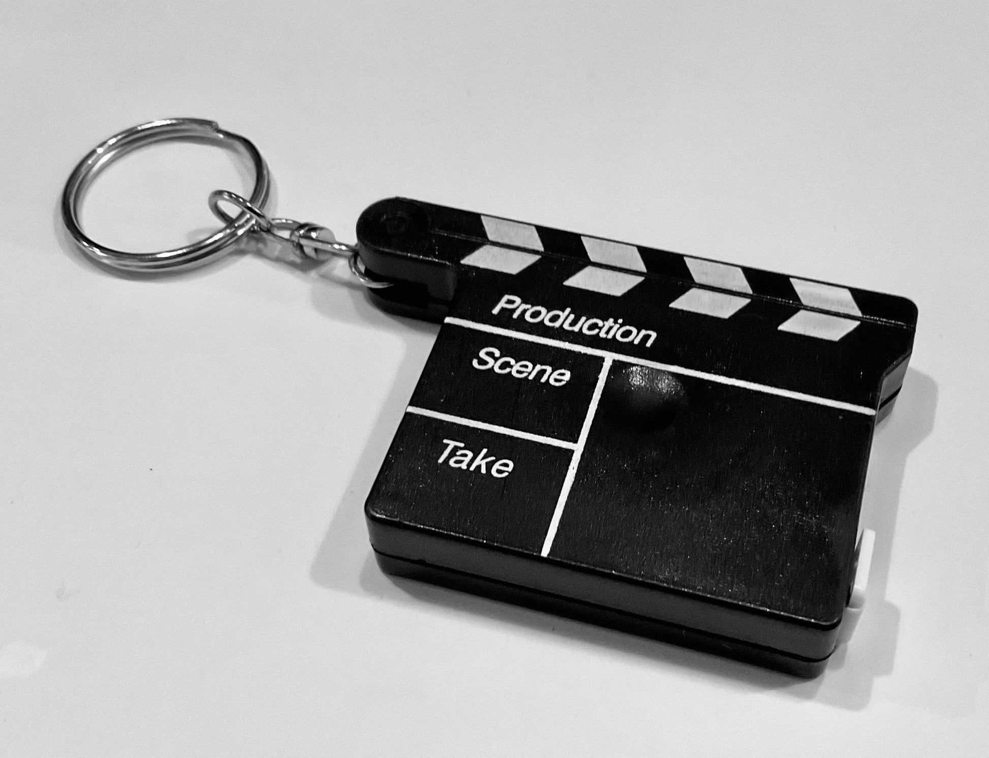 Film Keychain with Tape Measure