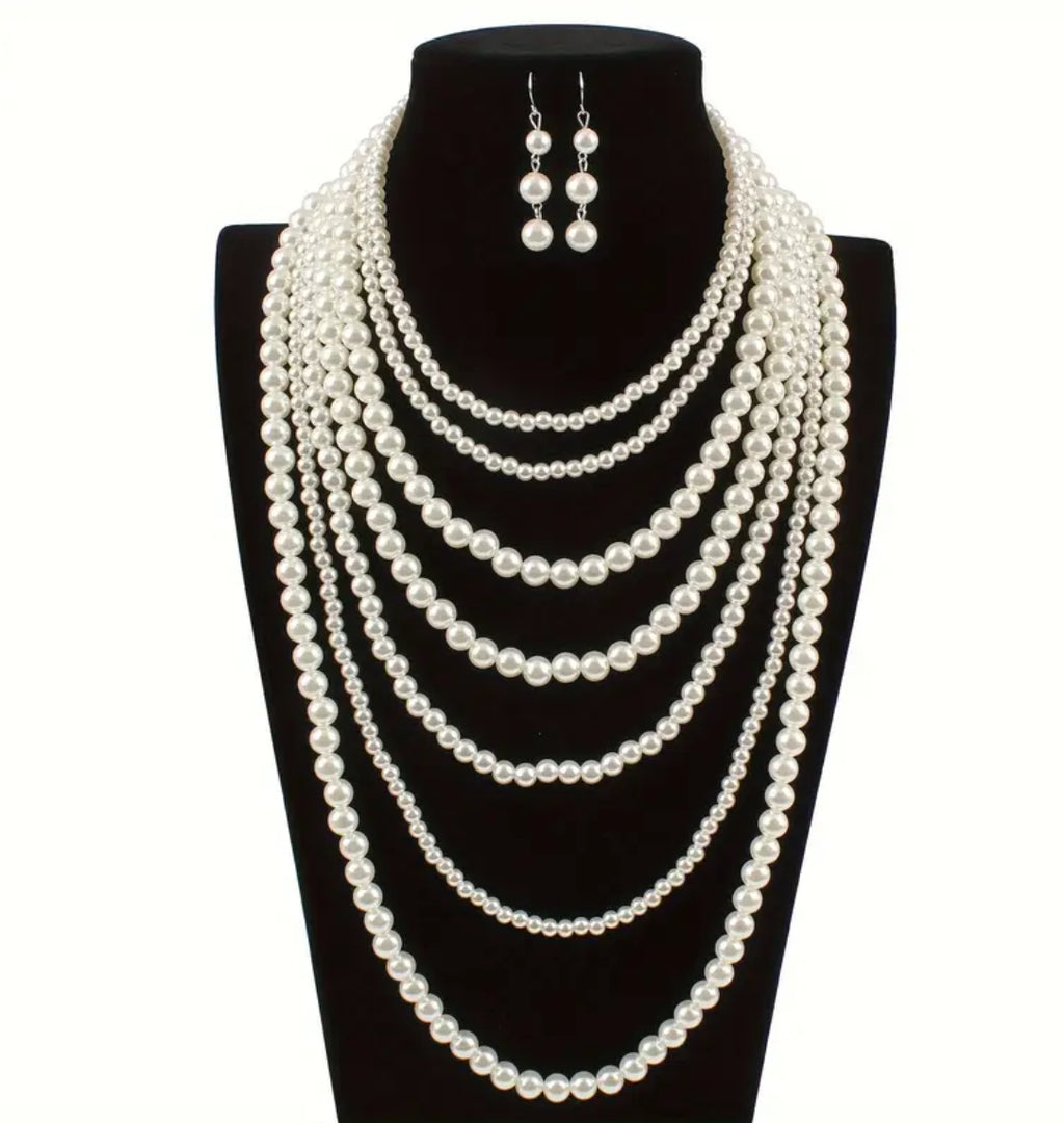 Ensemble collier et boucles d'oreilles en perles