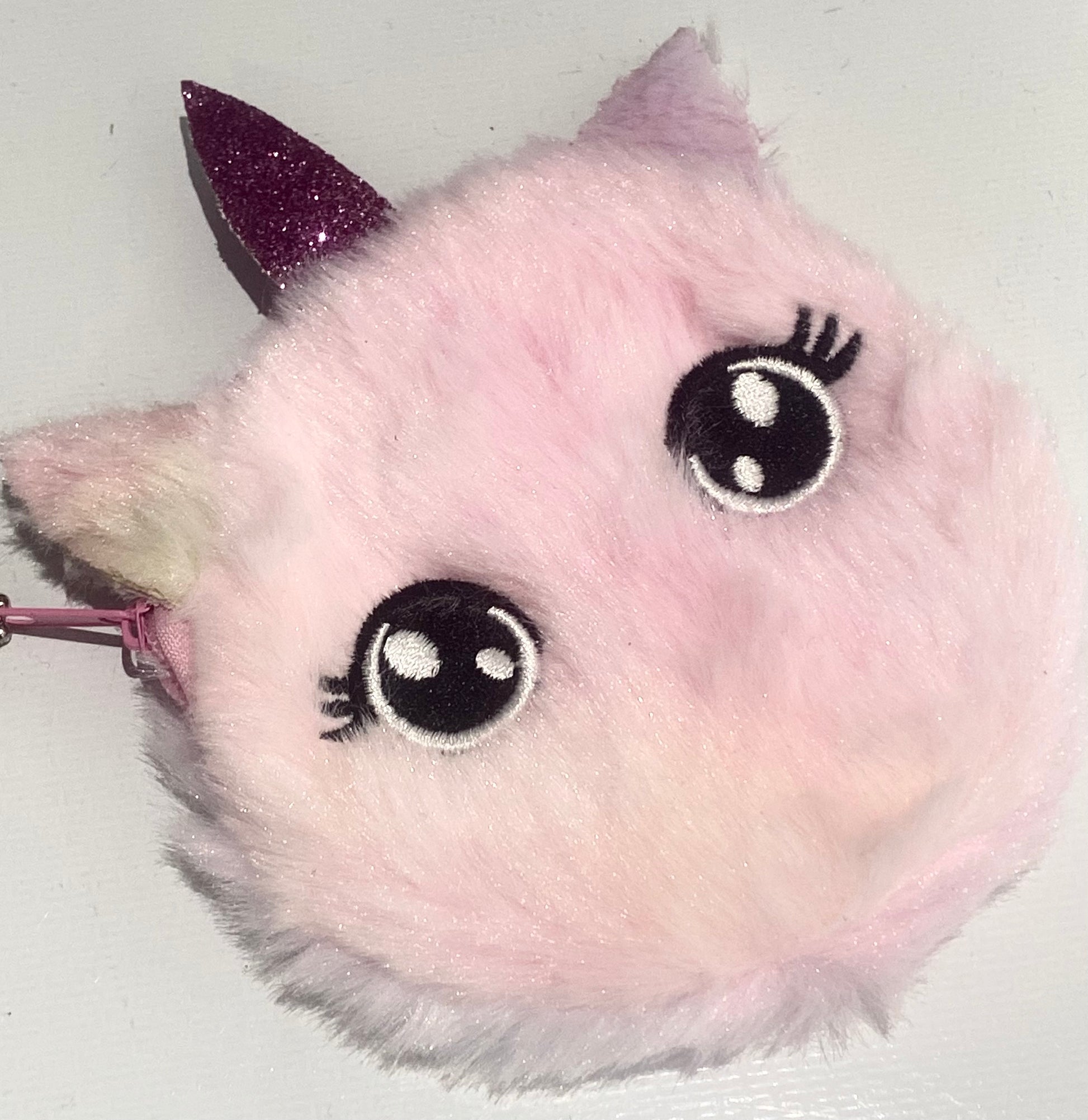 Fluffy unicorn pouch