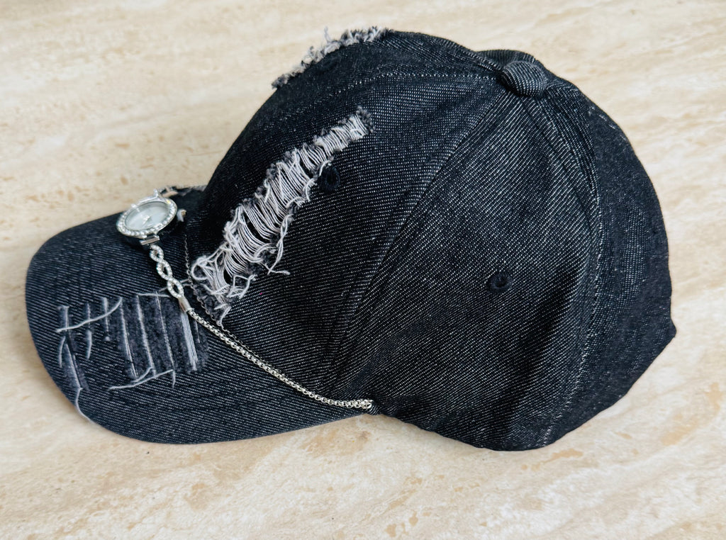 Torn black denim cap