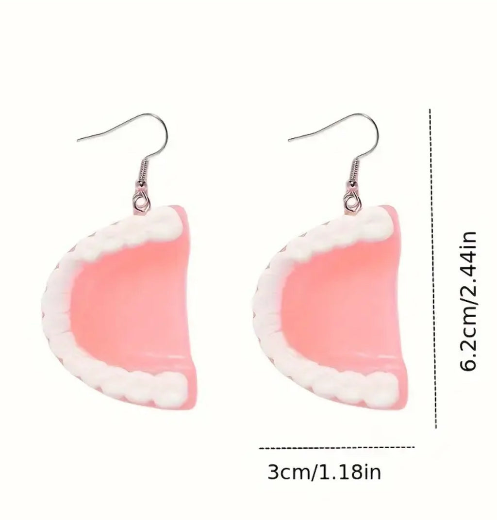 Boucles d'oreilles dents