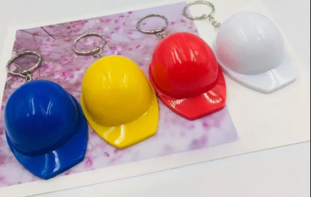 Porte-clés décapsuleur pour casque de chantier