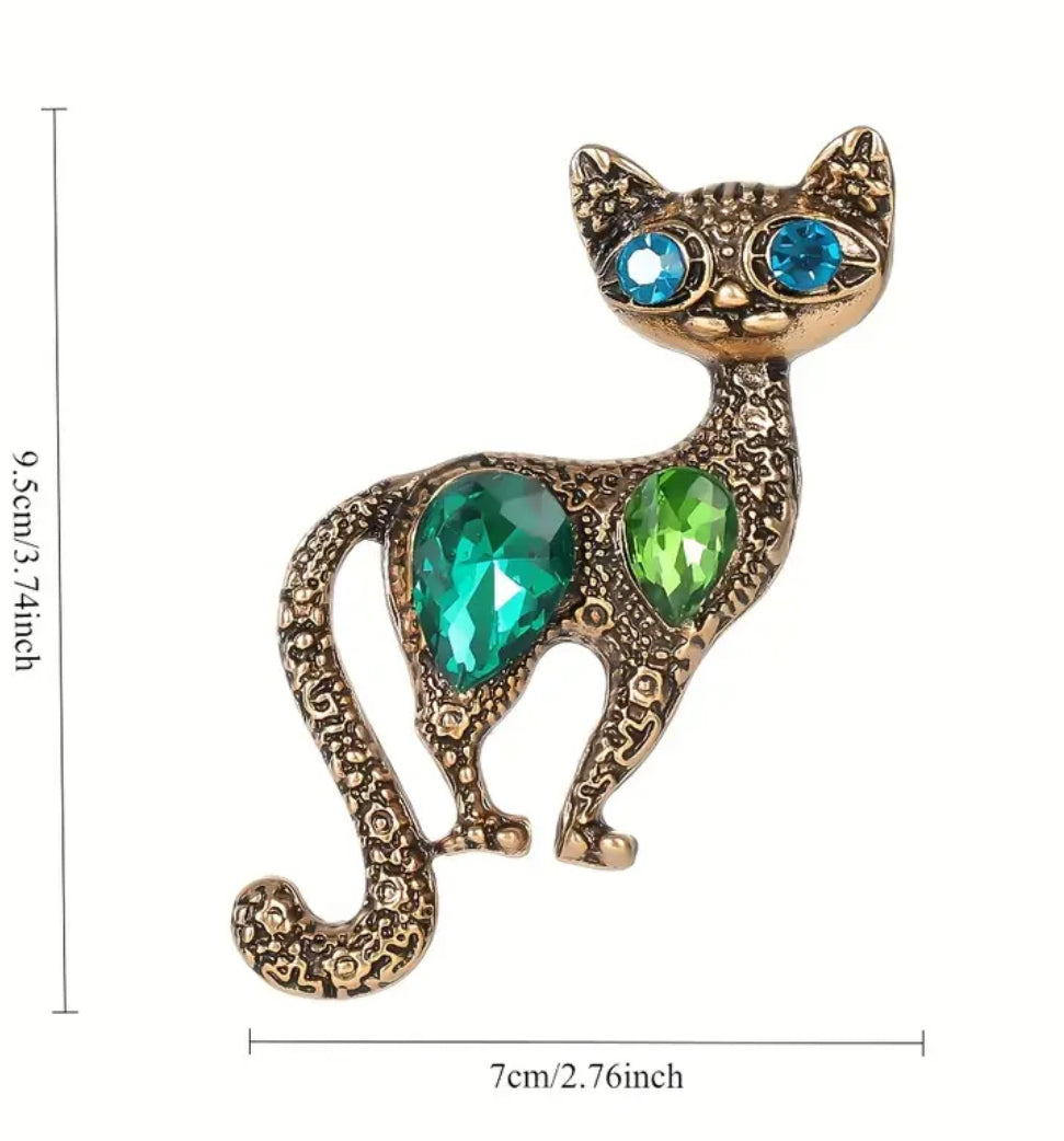 Gold Cat Brooch with Blue Eyes