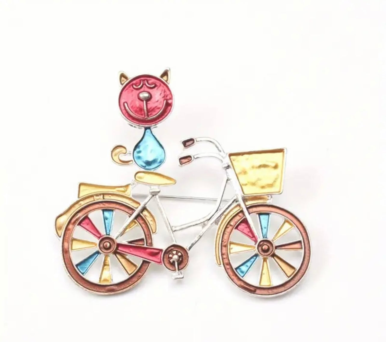 Broche élégante et colorée en émail représentant un chat sur un vélo