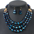 Ensemble collier et boucles d'oreilles en perles bleues