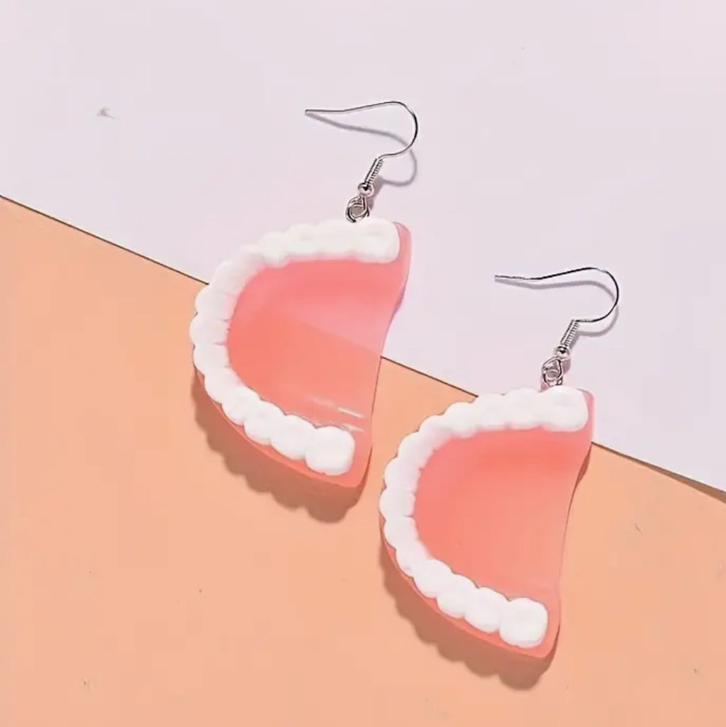 Boucles d'oreilles dents