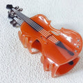 Pince à cheveux en forme de griffe de violon