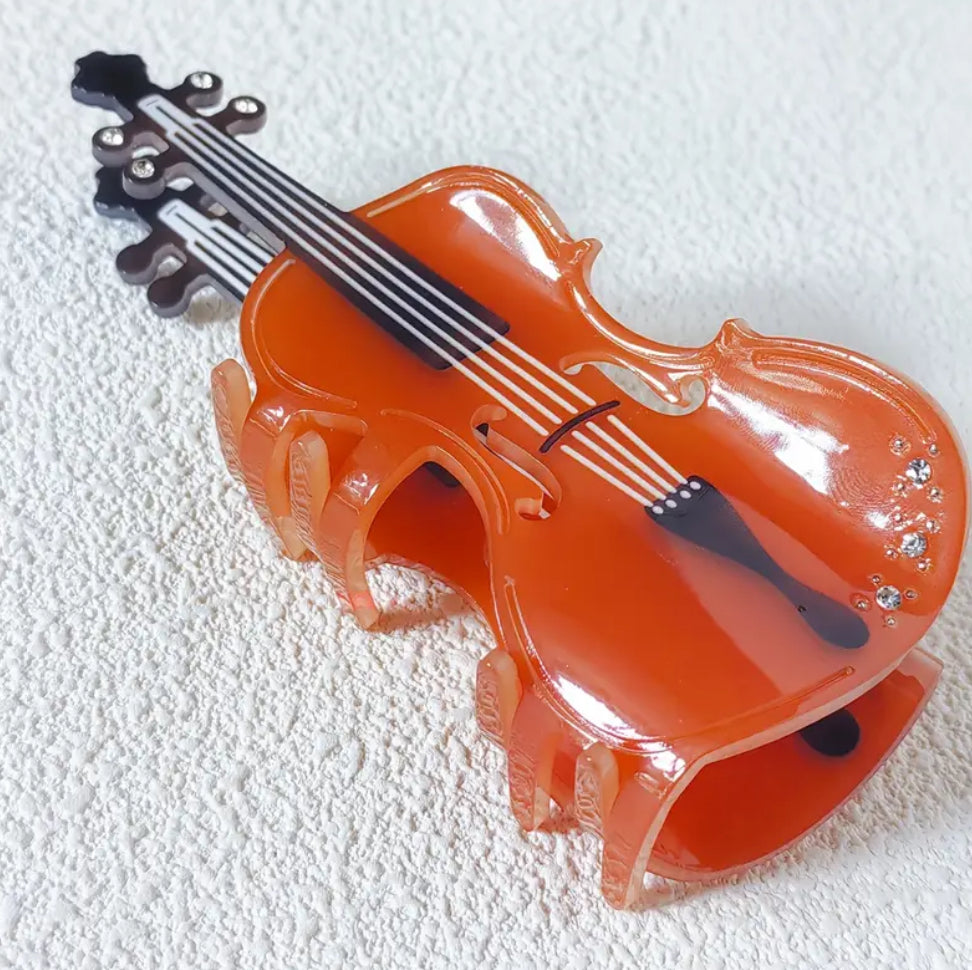 Pince à cheveux en forme de griffe de violon