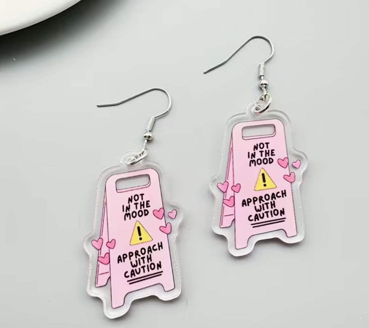 Caution Already overstimulated earrings