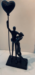 Cast-Iron Couple with Balloon