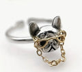 Bulldog dog with glasses and chain ring