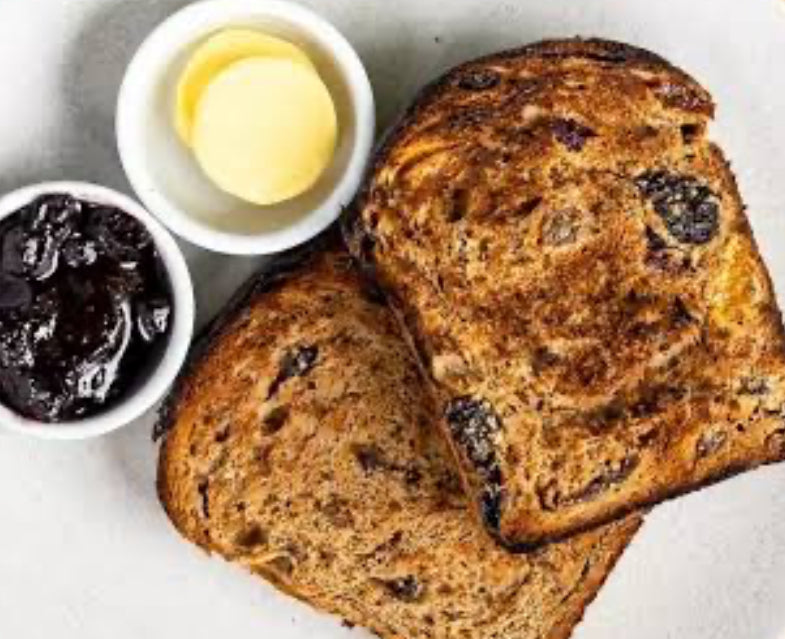 Raisin toast slice with butter and jam