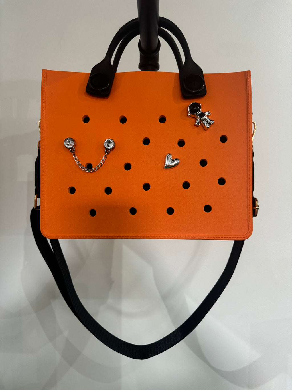 Sac en caoutchouc avec sangle et poche intérieure zippée