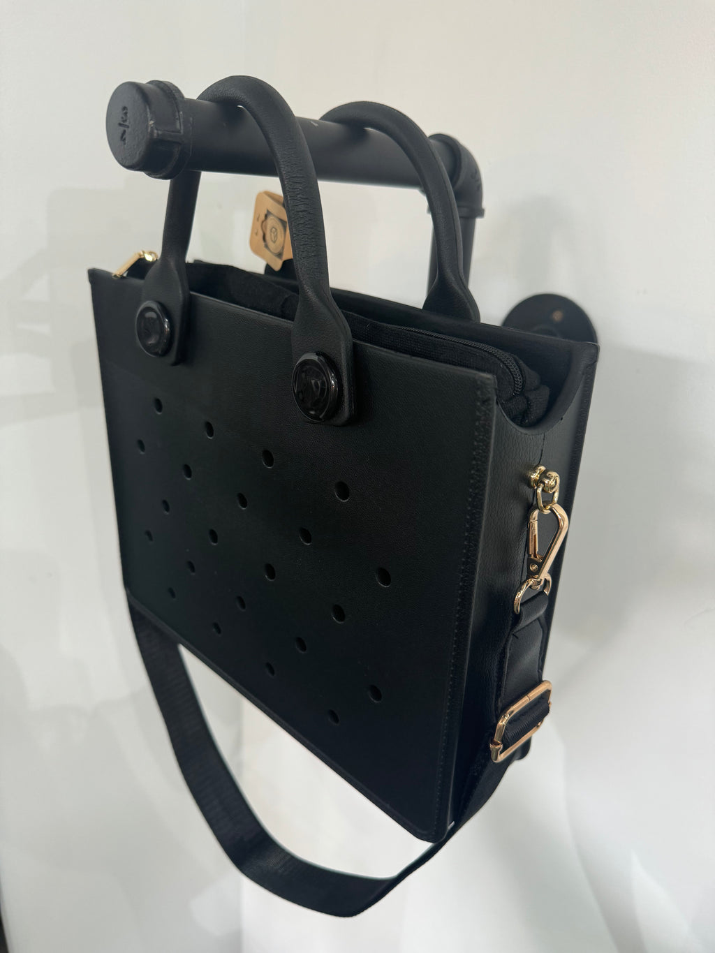 Sac en caoutchouc avec sangle et poche intérieure zippée