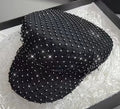 Casquette noire et diamant