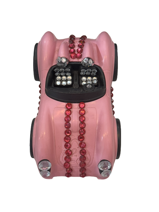 Voiture jouet rose éblouissante