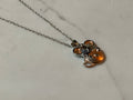 Collier Koala dans une tasse de thé
