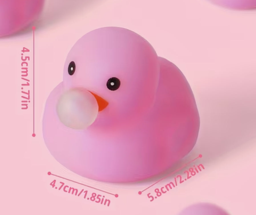 Canard en caoutchouc soufflant des bulles