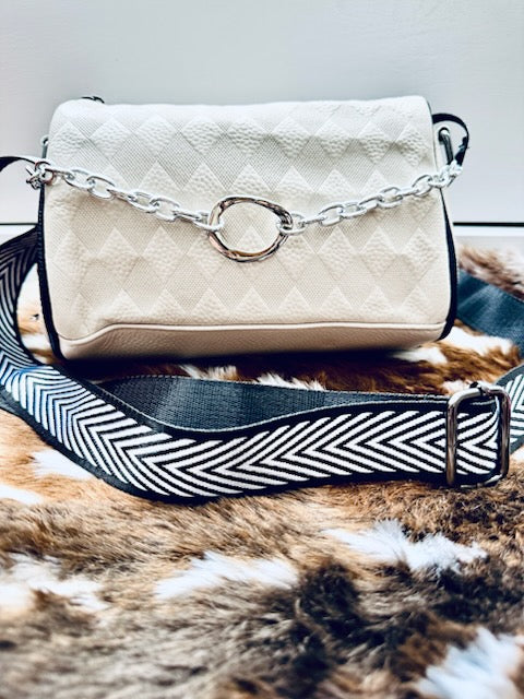 Embossed leather handbags