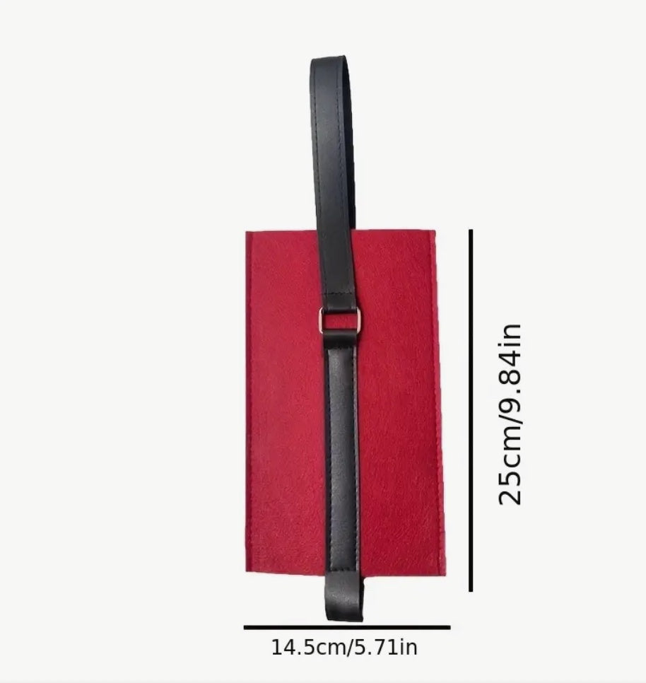 Red felt wine bag with black handle.