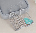 Boucles d'oreilles cage à oiseaux plaquées argent