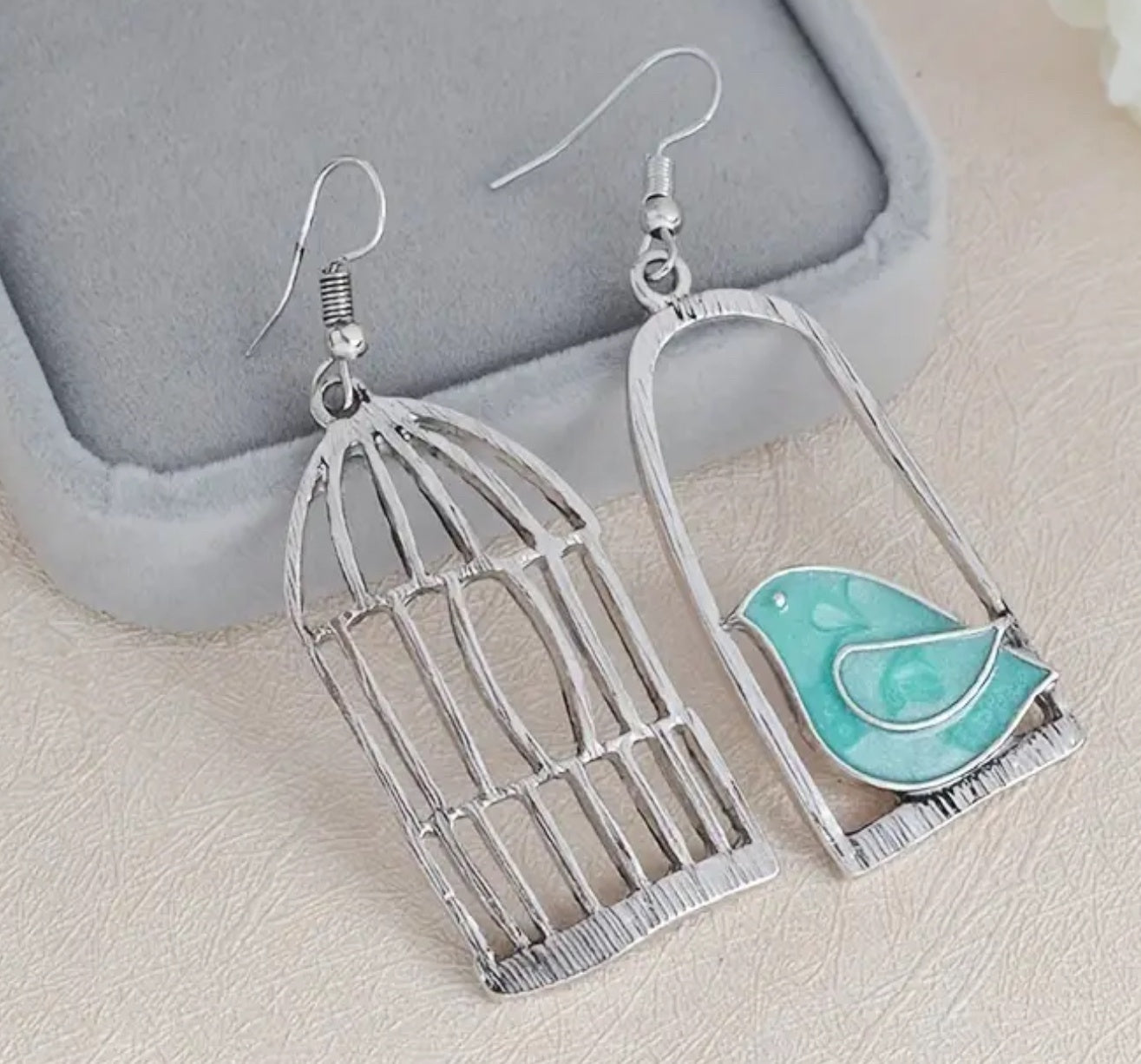 Boucles d'oreilles cage à oiseaux plaquées argent