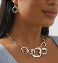 Ensemble collier et boucles d'oreilles géométriques en argent