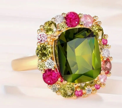 Zirconia green and pink gold plated ring.