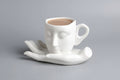 Face mug and hand saucer set