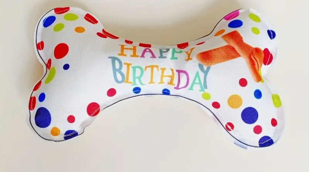 Peluche en forme d'os d'anniversaire