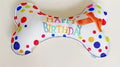 Peluche en forme d'os d'anniversaire
