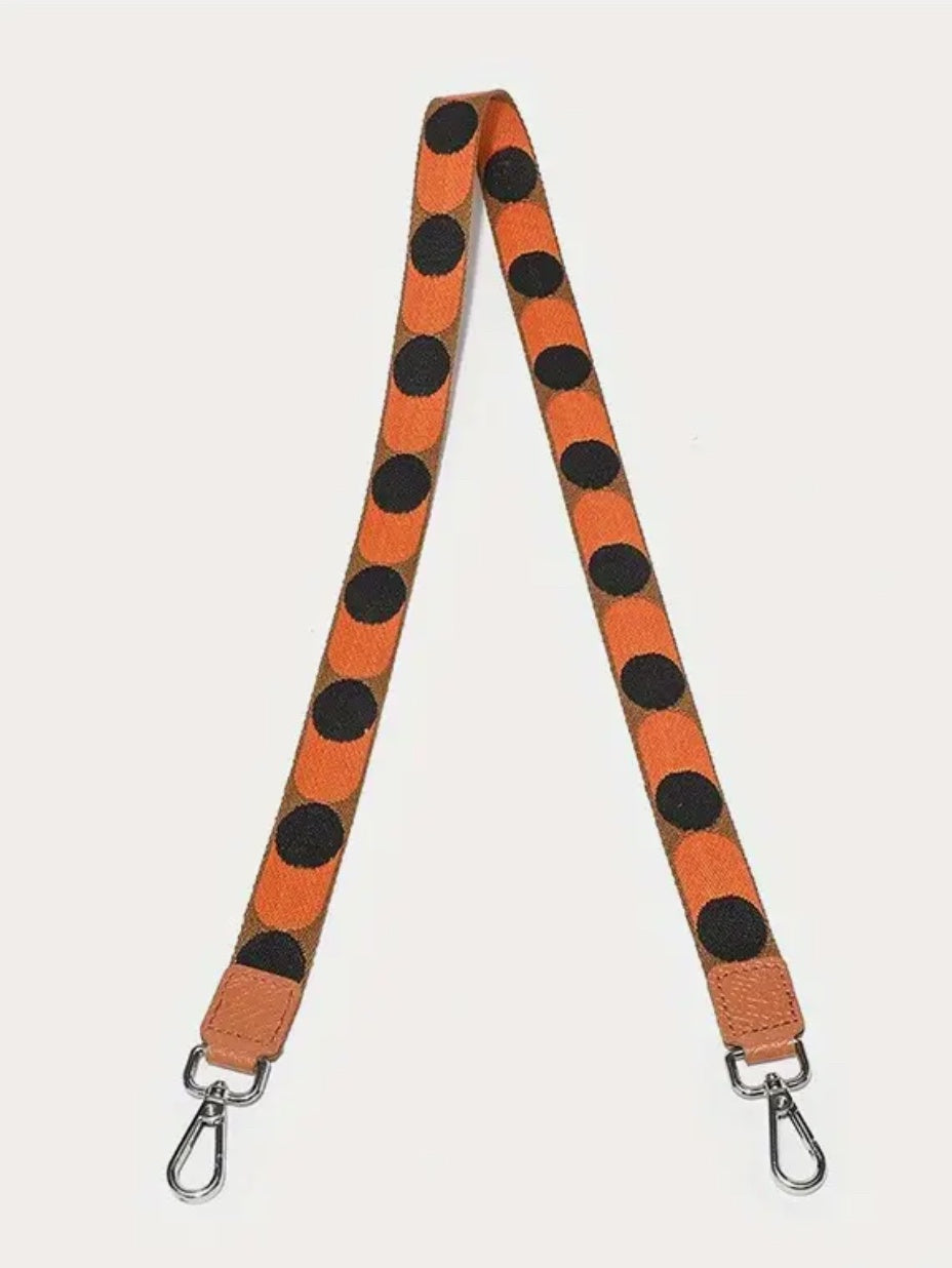 Orange and black spotty bag strap