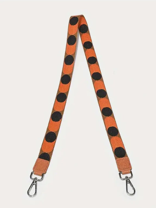 Orange and black spotty bag strap