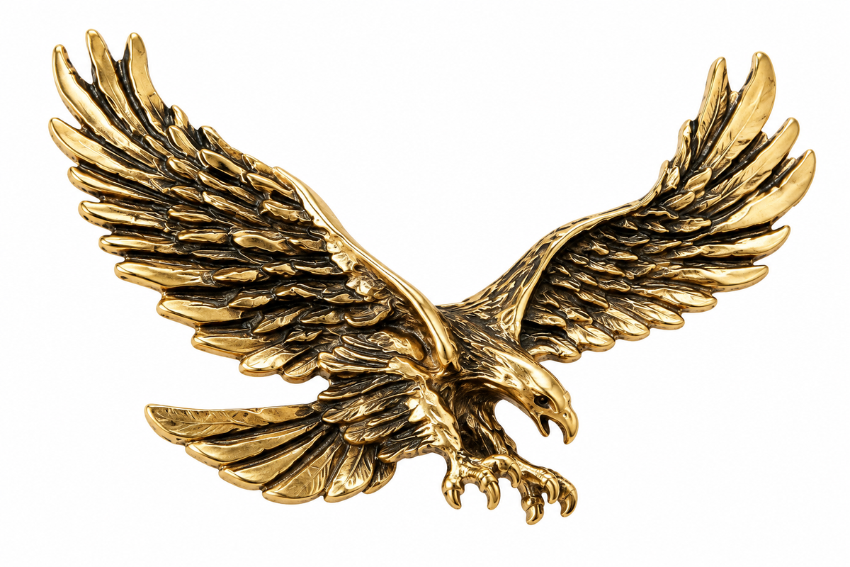 Antique gold eagle in flight brooch on white background