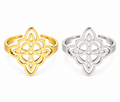 Gold and silver stainless steel Celtic knot adjustable rings on white background