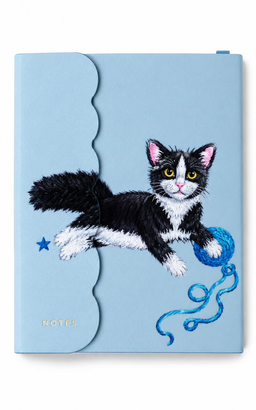 Illustrative example of cat portrait on blue A5 journal