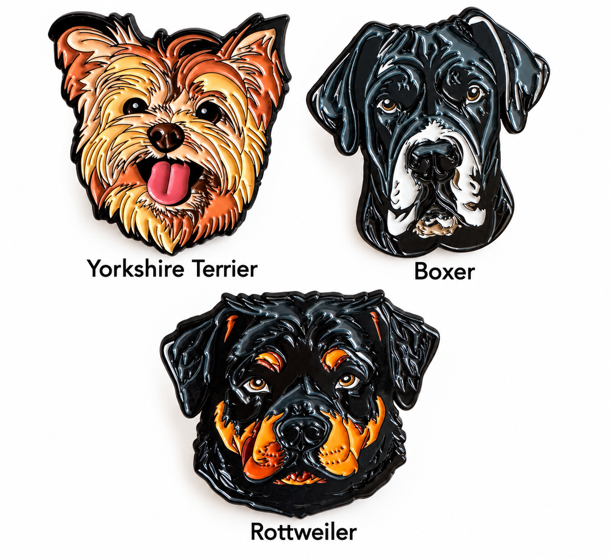 Three dog breed enamel pins with names on white background