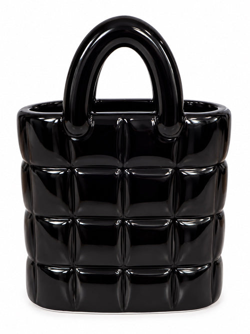 Glossy black quilted ceramic handbag vase on a clean white background