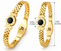 Gold stainless steel Roman numeral LOVE bangle bracelet with black centre disc