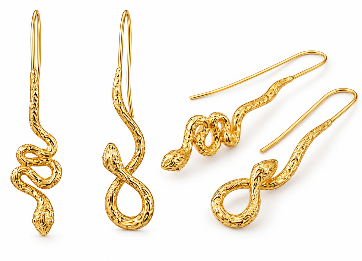 Gold tone zinc alloy snake drop earrings on white background