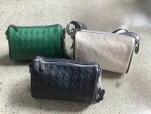 Embossed leather handbags