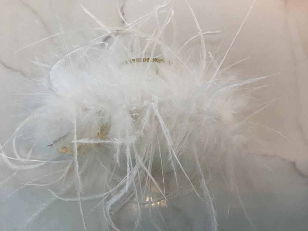 Pince à cheveux en forme de plume