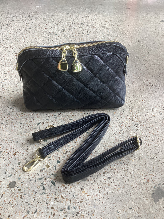 Leather quilted clutch handbag