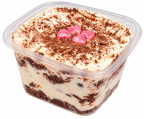 Red velvet dessert tub layered with vanilla-style icing, chocolate shavings and four pink chocolate hearts